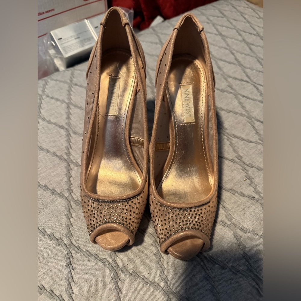Beige high heel shoes